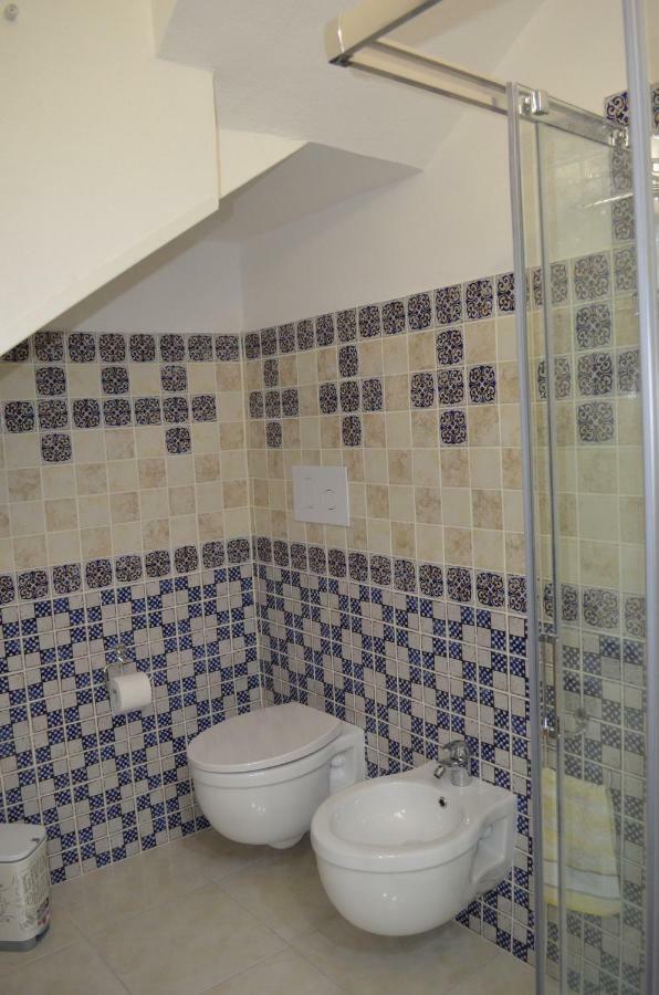 Отель La Casa Di Angelo Боса Экстерьер фото
